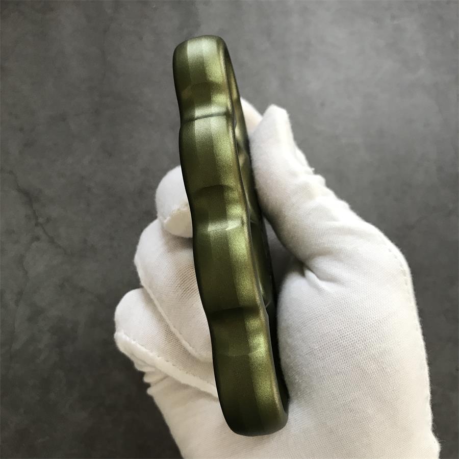Fractured shield aluminum knuckle duster held