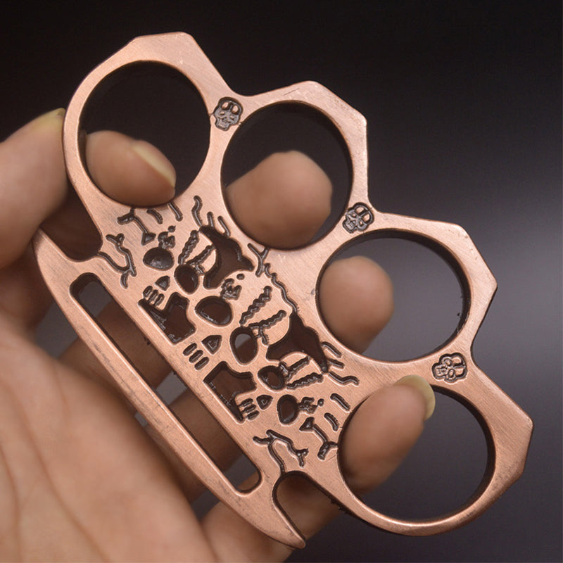 Ghost brass knuckle duster rose gold