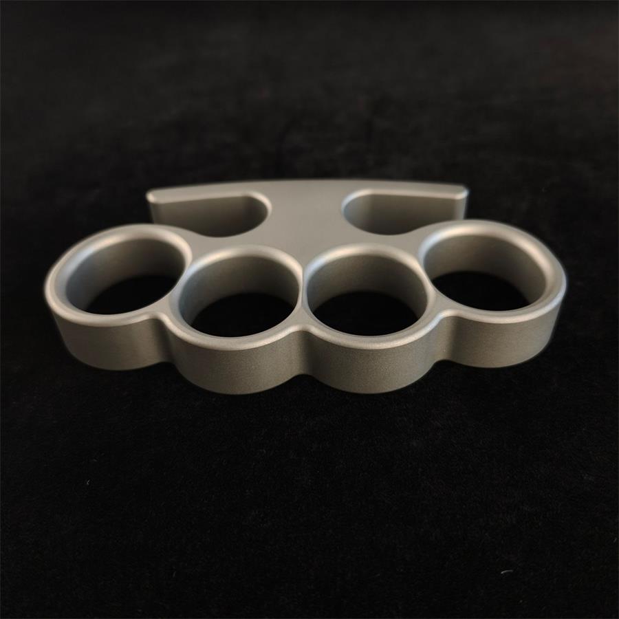 Solid classic TC21 titanium knuckle duster grip