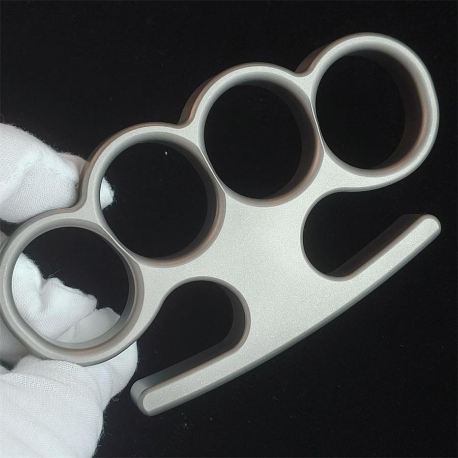 Solid classic TC21 titanium knuckle duster front
