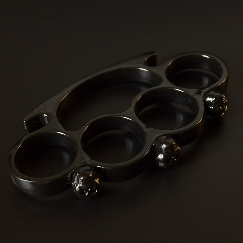 black little ghost brass knuckle duster